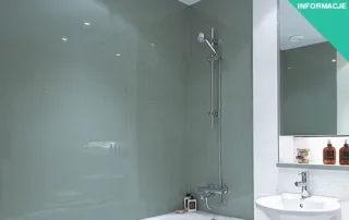 Nowoczesne wnętrze łazienki z przegrodą prysznicową Szkło lacobel i białą umywalką.